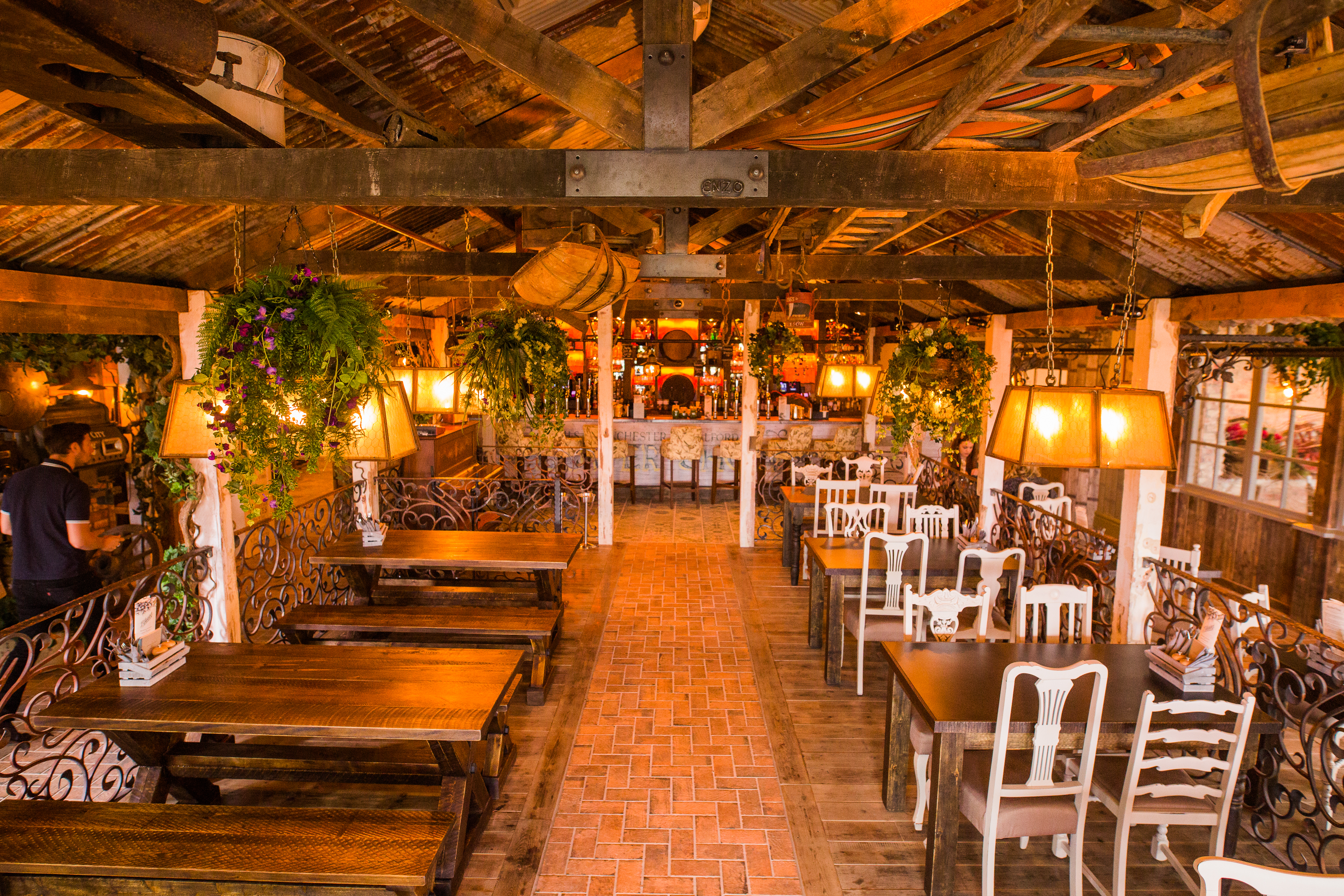 The inside of the Botanist showing tables and chairs