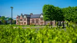 Exterior view of Ordsall Hall on a sunny day