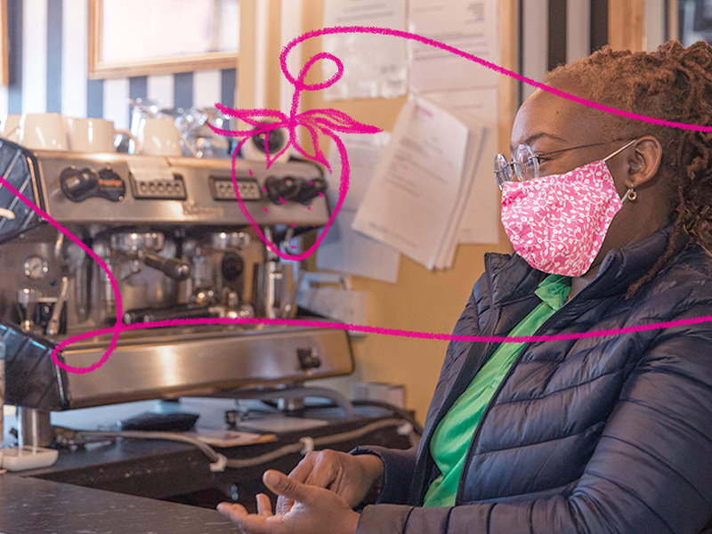 A woman working in a cafe