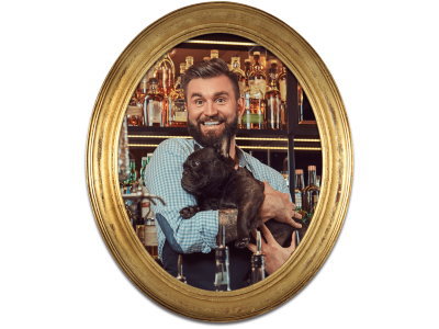 A man holding a dog