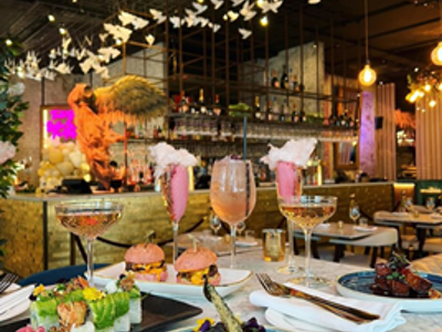 An image of different food and cocktails from Menagerie restaurant