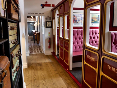 AN image of old train carriages which are now used as dinning spots 