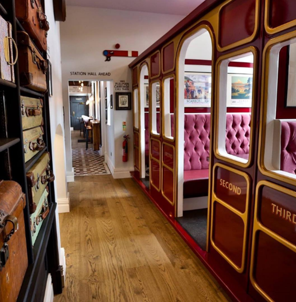 An image of old train carriages, now used as a restaurant